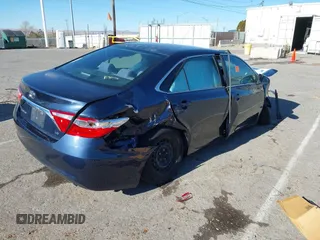 2015 Toyota Camry XLE with VIN 4T4BF1FK3FR505961, listed as a IAAI auction lot 41042038 with Not Provided miles and . Bid and sale history available at carsss.com. Image 4.