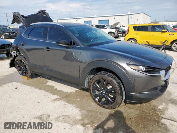 2023 Mazda CX-30 Premium Plus with VIN 3MVDMBEY6PM500458, listed as a Copart auction lot 50549475 with 21,900 mi miles and Salvage title. Bid and sale history available at DreamBid. Image 4.
