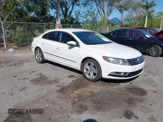 2013 Volkswagen CC Sport Plus z VIN WVWBP7AN5DE550701, wystawiony jako IAAI lot #41791421 z przebiegiem 124 503 mil mil oraz . Historia ofert i sprzedaży dostępna na DreamBid. Obrazek 1.