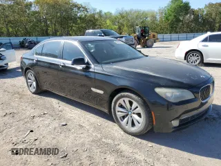 2012 BMW 7 Series 740Li with VIN WBAKB4C53CC577025, listed as a Copart auction lot 50355884 with 138,563 mi miles and Salvage Title. Bid and sale history available at carsss.com. Image 4.