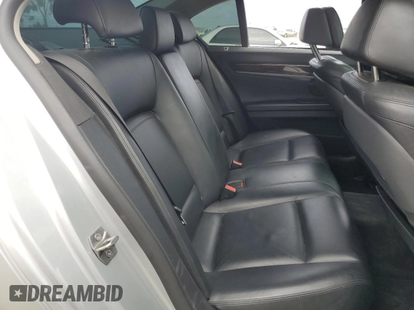 2013 BMW 7 Series 750i with VIN WBAYA8C57DC996498, listed as a Copart auction lot 52907415 with 109,405 mi miles and Salvage Title. Bid and sale history available at DreamBid. Image 10.