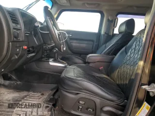 2006 Hummer H3 with VIN 5GTDN136168305793, listed as a Copart auction lot 77040914 with 149,400 mi miles and Salvage Title. Bid and sale history available at carsss.com. Image 7.