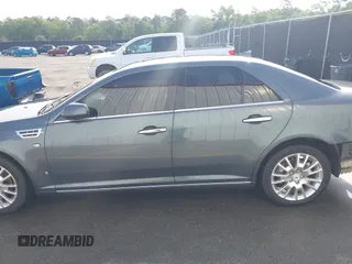 2009 Cadillac STS AWD w/1SB with VIN 1G6DD67V090151883, listed as a IAAI auction lot 42075438 with 97,408 mi miles. Bid and sale history available at carsss.com. Image 15.