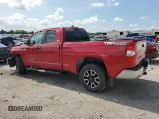 2021 Toyota Tundra SR with VIN 5TFUY5F11MX971951, listed as a Copart auction lot 64889875 with 69,297 mi miles and Salvage title. Bid and sale history available at DreamBid. Image 2.