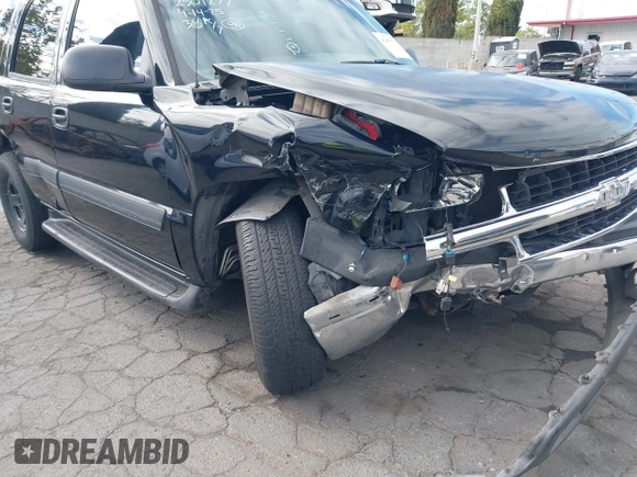 2005 Chevrolet Tahoe Z71 with VIN 1GNEC13TX5R145310, listed as a IAAI auction lot 42056793 with 159,002 mi miles and . Bid and sale history available at DreamBid. Image 6.