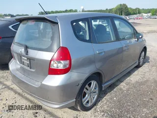 2008 Honda Fit Sport with VIN JHMGD386X8S058659, listed as a IAAI auction lot 42168584 with 210,589 mi miles. Bid and sale history available at carsss.com. Image 4.
