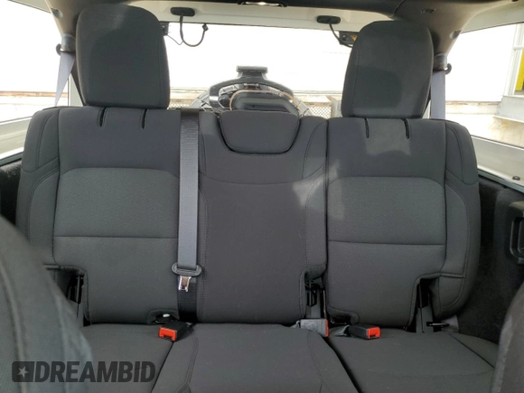 2023 Jeep Wrangler Sport with VIN 1C4HJXDN0PW643485, listed as a Copart auction lot 59783564 with 14,001 mi miles and Salvage Title. Bid and sale history available at DreamBid. Image 10.