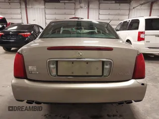 2004 Cadillac DeVille z VIN 1G6KD54Y04U119341, wystawiony jako IAAI lot #42193664 z przebiegiem 162 290 mil mil oraz . Historia ofert i sprzedaży dostępna na DreamBid. Obrazek 17.