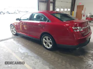 2013 Ford Taurus SEL with VIN 1FAHP2E99DG180535, listed as a IAAI auction lot 41741619 with 193,665 mi miles and . Bid and sale history available at carsss.com. Image 3.