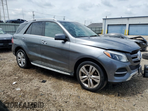 2018 Mercedes-Benz GLE 350 with VIN 4JGDA5HB1JB117315, listed as a Copart auction lot 57871285 with 144,261 mi miles and Salvage title. Bid and sale history available at DreamBid. Image 4.