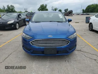 2018 Ford Fusion SE z VIN 3FA6P0LU5JR132702, wystawiony jako Copart lot #61089115 z przebiegiem 123 854 mil mil oraz Czysty tytuł • Clean title. Historia ofert i sprzedaży dostępna na DreamBid. Obrazek 5.