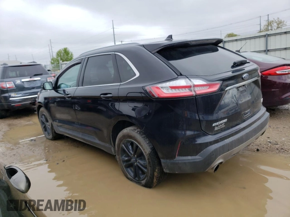 2020 Ford Edge SEL с VIN 2FMPK4J90LBA34676, выставлен на аукционе Copart как лот 55577665 с пробегом 113 214 миль миль и Списание • Salvage title. История ставок и продаж доступна на DreamBid. Изображение 2.