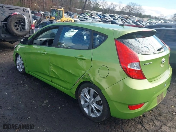 2012 Hyundai Accent SE with VIN KMHCU5AE2CU026701, listed as a IAAI auction lot 41303728 with 66,855 mi miles. Bid and sale history available at carsss.com. Image 3.