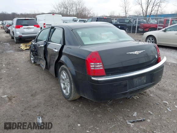 2006 Chrysler 300 C with VIN 2C3KA63H06H189591, listed as a IAAI auction lot 41810691 with 184,465 mi miles. Bid and sale history available at carsss.com. Image 3.