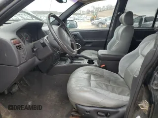 2000 Jeep Grand Cherokee Laredo with VIN 1J4GW48S2YC336733, listed as a Copart auction lot 54553315 with 284,402 mi miles and Non repairable. Bid and sale history available at DreamBid. Image 7.
