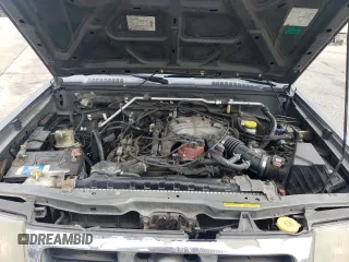 2000 Nissan Frontier XE with VIN 1N6ED27T5YC426456, listed as a Copart auction lot 54411425 with 117,600 mi miles and Salvage title. Bid and sale history available at DreamBid. Image 11.