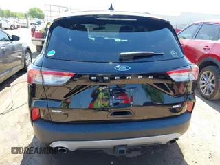 2020 Ford Escape SEL z VIN 1FMCU9H91LUB86584, wystawiony jako IAAI lot #42268456 z przebiegiem 94 753 mil mil oraz . Historia ofert i sprzedaży dostępna na DreamBid. Obrazek 17.