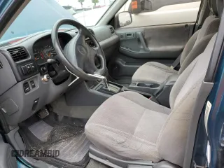1999 Isuzu Rodeo S with VIN 4S2CK58W9X4322074, listed as a Copart auction lot 76999244 with 110,142 mi miles and Salvage Title. Bid and sale history available at carsss.com. Image 7.