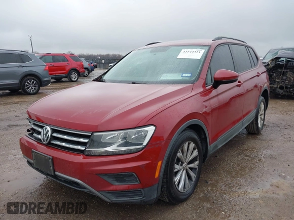 2018 Volkswagen Tiguan S with VIN 3VV1B7AX8JM124827, listed as a IAAI auction lot 41544321 with 101,492 mi miles and . Bid and sale history available at DreamBid. Image 2.