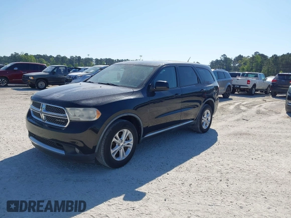 2012 Dodge Durango SXT with VIN 1C4RDHAG3CC195620, listed as a IAAI auction lot 42059797 with 148,570 mi miles. Bid and sale history available at carsss.com. Image 2.