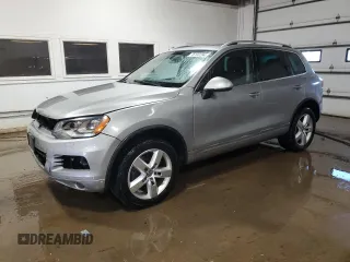 2011 Volkswagen Touareg с VIN WVGFG9BPXBD002222, выставлен на аукционе Copart как лот 76120284 с пробегом 145 912 миль миль и Списание • Salvage title. История ставок и продаж доступна на DreamBid. Изображение 1.