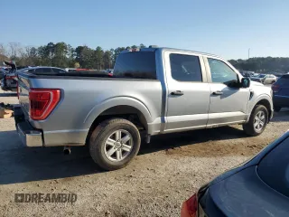 2023 Ford F-150 XL with VIN 1FTEW1C84PKD44022, listed as a Copart auction lot 48854095 with 56,526 mi miles and Clean title. Bid and sale history available at DreamBid. Image 3.