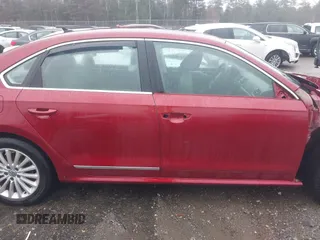2016 Volkswagen Passat SE z VIN 1VWBT7A31GC023486, wystawiony jako IAAI lot #41205417 z przebiegiem 90 005 mil mil oraz . Historia ofert i sprzedaży dostępna na DreamBid. Obrazek 13.