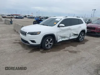 2019 Jeep Cherokee Limited with VIN 1C4PJLDB4KD346296, listed as a IAAI auction lot 41364345 with 171,855 mi miles and . Bid and sale history available at DreamBid. Image 14.