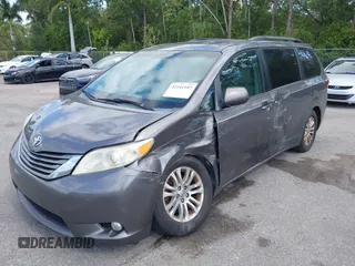 2015 Toyota Sienna XLE with VIN 5TDYK3DC3FS556859, listed as a IAAI auction lot 42161107 with 200,502 mi miles and . Bid and sale history available at DreamBid. Image 6.
