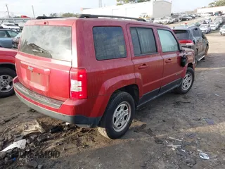 2015 Jeep Patriot Altitude Edition with VIN 1C4NJPBA8FD284559, listed as a IAAI auction lot 41495746 with 165,245 mi miles. Bid and sale history available at carsss.com. Image 4.