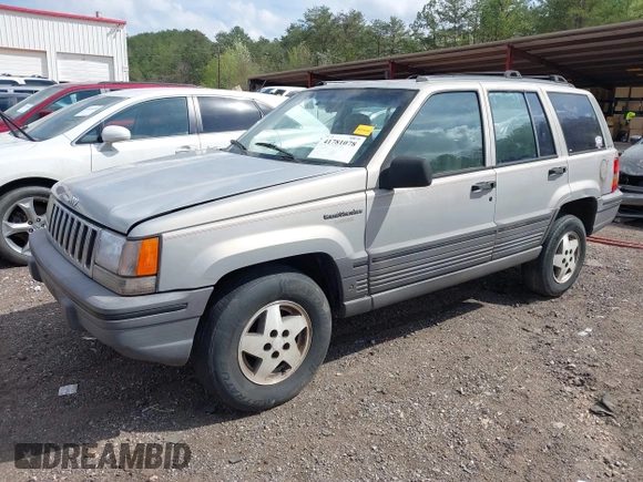 1994 Jeep Grand Cherokee Laredo with VIN 1J4GZ58Y0RC200247, listed as a IAAI auction lot 41781078 with 217,698 mi miles. Bid and sale history available at carsss.com. Image 2.