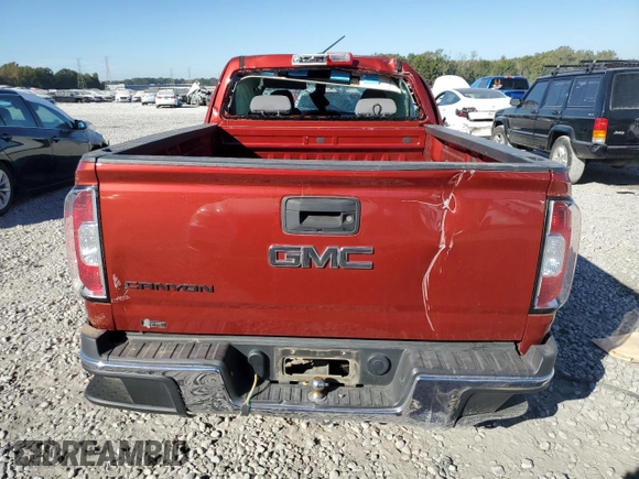 2015 GMC Canyon 2WD with VIN 1GTH5AE30F1182024, listed as a Copart auction lot 77032494 with 55,845 mi miles and Salvage Title. Bid and sale history available at carsss.com. Image 6.
