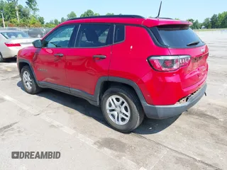 2018 Jeep Compass Sport with VIN 3C4NJCABXJT308768, listed as a IAAI auction lot 42420499 with 84,285 mi miles and . Bid and sale history available at DreamBid. Image 3.