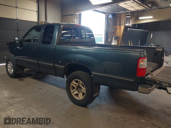 1996 Toyota T100 DX with VIN JT4UN22D2T0020138, listed as a IAAI auction lot 41912550 with 164,007 mi miles. Bid and sale history available at carsss.com. Image 3.