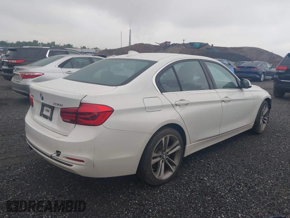 2017 BMW 3 Series 330i xDrive with VIN WBA8D9G39HNU63519, listed as a IAAI auction lot 42330597 with 80,498 mi miles and . Bid and sale history available at DreamBid. Image 4.