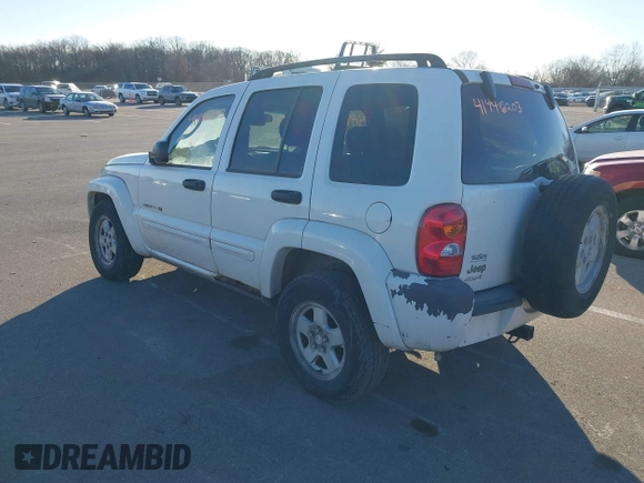 2003 Jeep Liberty Limited with VIN 1J8GL58K33W591945, listed as a IAAI auction lot 41446203 with 196,857 mi miles and . Bid and sale history available at DreamBid. Image 3.