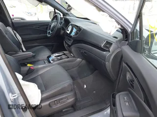 2023 Honda Passport Elite with VIN 5FNYF8H03PB000039, listed as a IAAI auction lot 40593339 with 33,697 mi miles and . Bid and sale history available at DreamBid. Image 5.