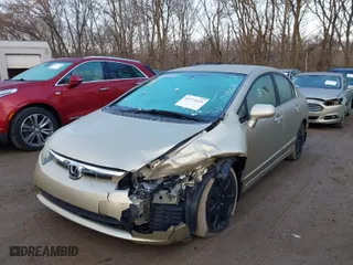2007 Honda Civic Sdn LX with VIN 1HGFA16567L032980, listed as a IAAI auction lot 41171625 with 153,889 mi miles. Bid and sale history available at carsss.com. Image 2.