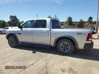 2017 Ram 1500 Rebel z VIN 1C6RR7YT4HS531035, wystawiony jako Copart lot #57652345 z przebiegiem 130 013 mil mil oraz Czysty tytuł • Clean title. Historia ofert i sprzedaży dostępna na DreamBid. Obrazek 2.