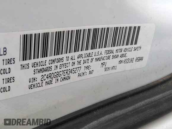 2014 Dodge Grand Caravan American Value with VIN 2C4RDGBG7ER345277, listed as a IAAI auction lot 42061355 with 145,889 mi miles and . Bid and sale history available at DreamBid. Image 9.