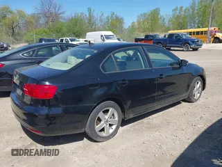 2012 Volkswagen Jetta TDI w/Premium & Nav z VIN 3VWLL7AJ7CM400382, wystawiony jako IAAI lot #42274839 z przebiegiem 150 205 mil mil oraz . Historia ofert i sprzedaży dostępna na DreamBid. Obrazek 4.