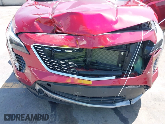 2021 Cadillac XT4 FWD Premium Luxury z VIN 1GYFZCR48MF004849, wystawiony jako IAAI lot #42131896 z przebiegiem 9 864 mil mil oraz . Historia ofert i sprzedaży dostępna na DreamBid. Obrazek 6.