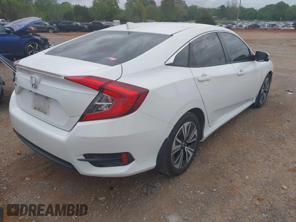 2017 Honda Civic EX-L with VIN 2HGFC1F72HH658763, listed as a IAAI auction lot 41972317 with 166,168 mi miles and . Bid and sale history available at DreamBid. Image 4.