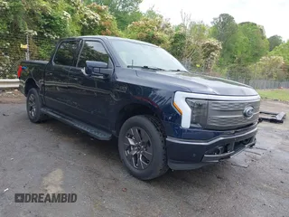 2023 Ford F-150 Lightning Pro with VIN 1FTVW1EL7PWG11924, listed as a IAAI auction lot 41991819 with 20,450 mi miles and . Bid and sale history available at DreamBid. Image 1.