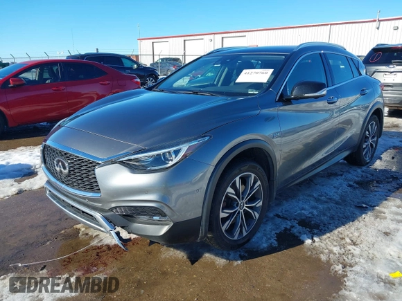 2018 Infiniti QX30 Premium z VIN SJKCH5CR7JA047290, wystawiony jako IAAI lot #41270760 z przebiegiem 72 169 mil mil oraz . Historia ofert i sprzedaży dostępna na DreamBid. Obrazek 17.
