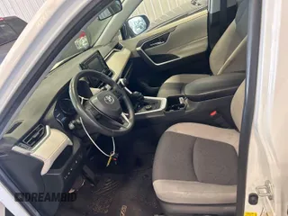 2022 Toyota RAV4 Hybrid XLE with VIN JTMRWRFV1ND164886, listed as a IAAI auction lot 42718931 with 97,775 mi miles and . Bid and sale history available at DreamBid. Image 1.