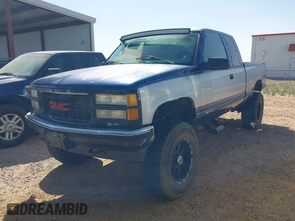 1995 GMC Sierra 1500 z VIN 2GTEK19K1S1553693, wystawiony jako IAAI lot #41742522 z przebiegiem 276 637 mil mil oraz . Historia ofert i sprzedaży dostępna na DreamBid. Obrazek 2.