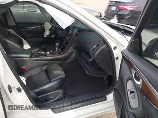 2015 Infiniti Q50 Premium z VIN JN1BV7APXFM352327, wystawiony jako IAAI lot #42367983 z przebiegiem 110 636 mil mil oraz . Historia ofert i sprzedaży dostępna na DreamBid. Obrazek 5.