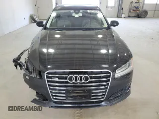 2016 Audi A8 Sport z VIN WAU43AFD1GN011589, wystawiony jako Copart lot #86614934 z przebiegiem 96 137 mil mil oraz Szkoda całkowita • Salvage title. Historia ofert i sprzedaży dostępna na DreamBid. Obrazek 5.