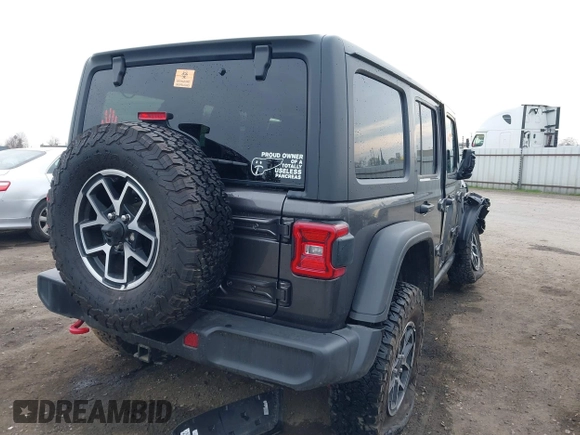 2024 Jeep Wrangler Rubicon with VIN 1C4PJXFG1RW314131, listed as a IAAI auction lot 41472426 with Not provided miles and . Bid and sale history available at DreamBid. Image 4.